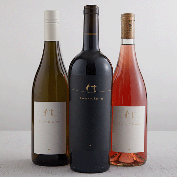Three wine bottles from harvey & harriet on a white background